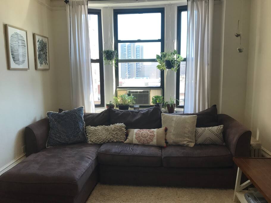 Bright and airy living room with L shaped couch