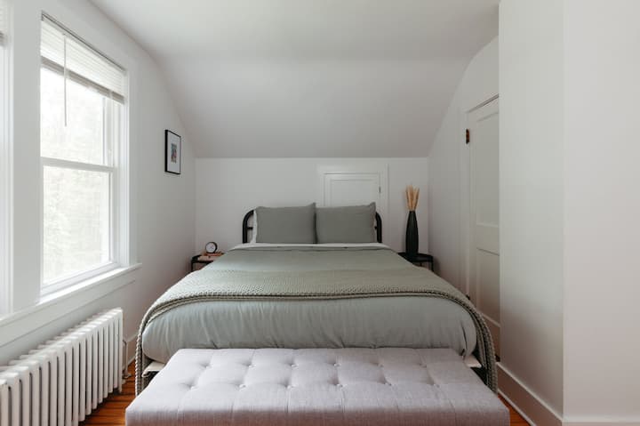 Queen size bed, new mattress, 100% organic cotton bedsheets, window treatments. All bedrooms feature it's own desk/chair to facilitate WFH. Located on second floor.