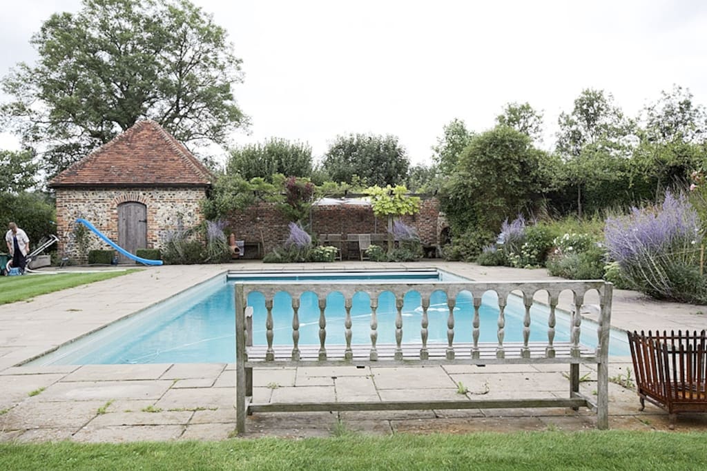 Swimming pool with separate kitchen, changing rooms and outside fireplace