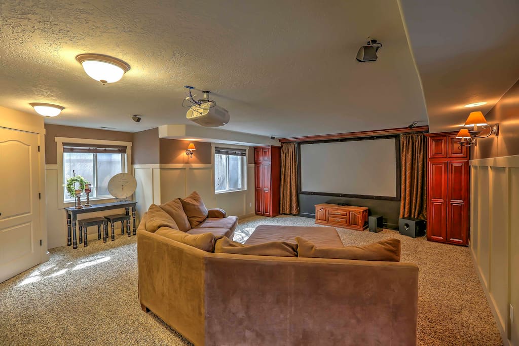 Grab a blanket and watch favorite movies in front of this home theater.