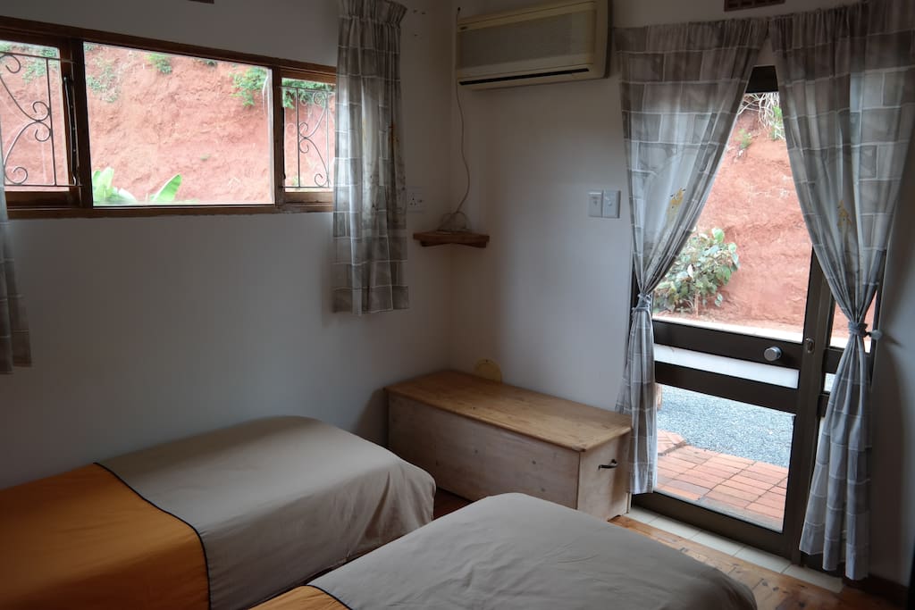 2 Single beds or 1 Queen - size bed in a non self-catering room with En-Suite bathroom