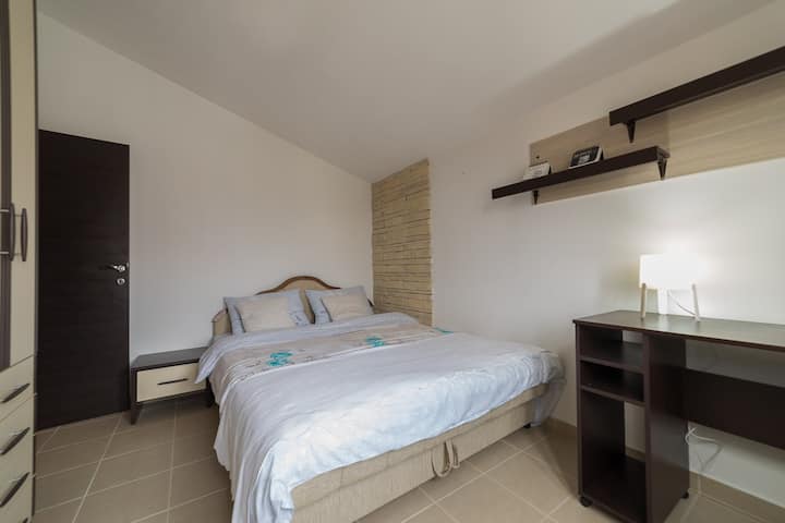 King size bed. Wardrobe. Bedroom. Big and relaxing place. You can rest, you can sleep well or you can read your favourite book or newspaper.