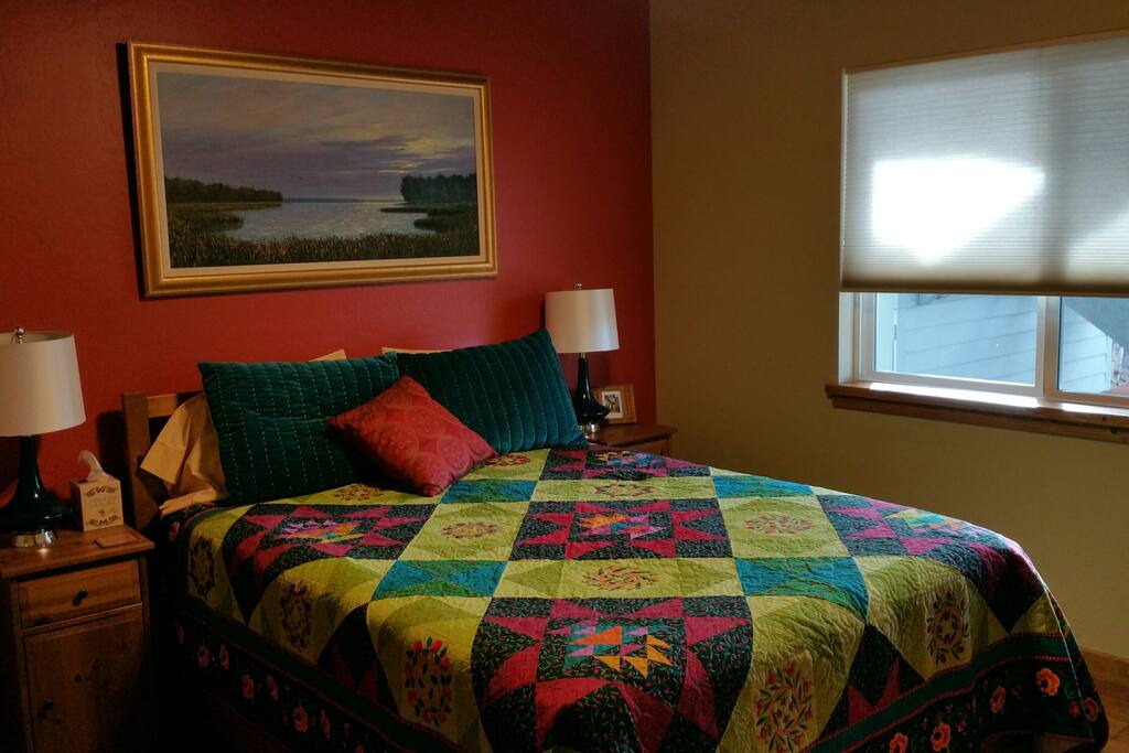 Cheery guest room with queen bed