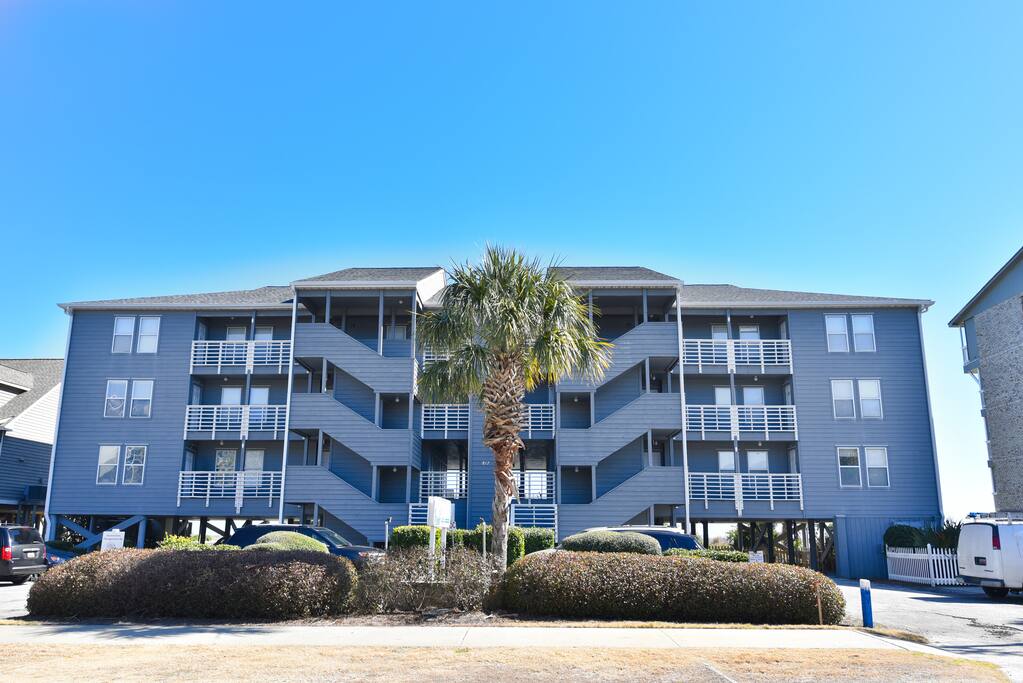 Front of building. Plenty of parking.