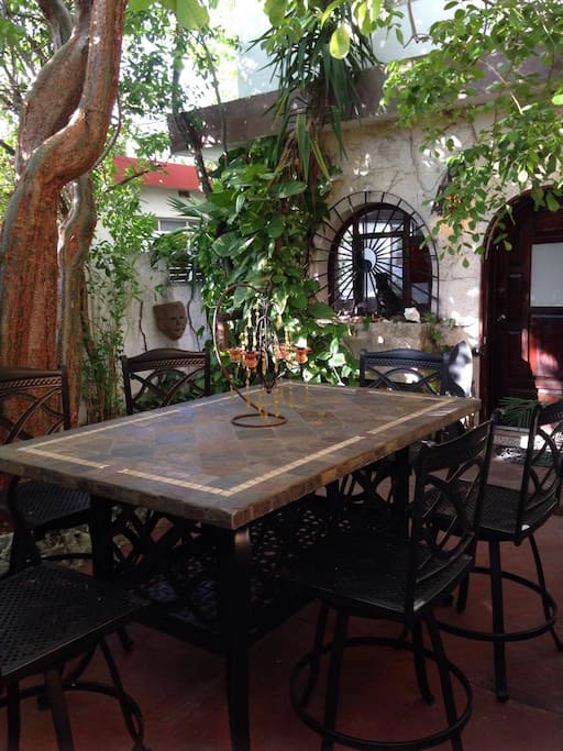Enjoy your morning coffee in the front garden great for entertaining guests.