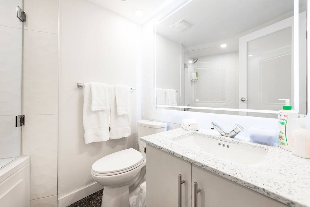 Renovated - ensuite bath off master, backlit mirror