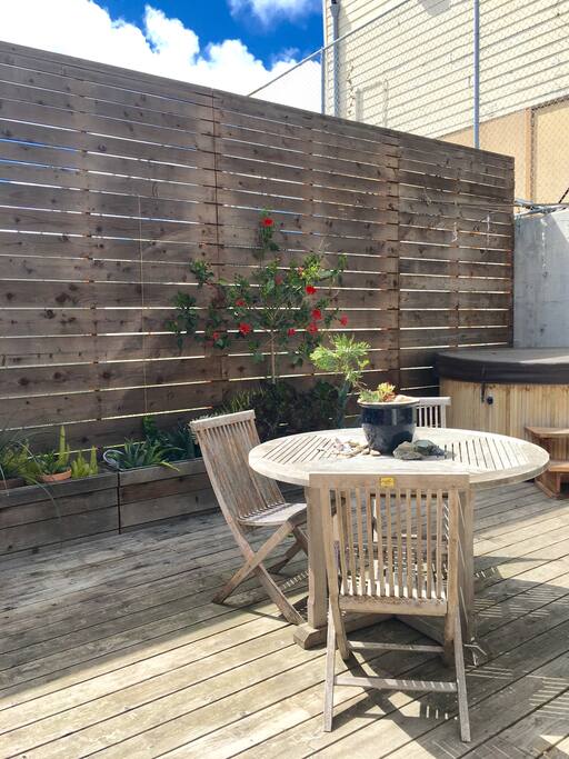 This is our family deck and hot tub. You will cross it to get to your studio