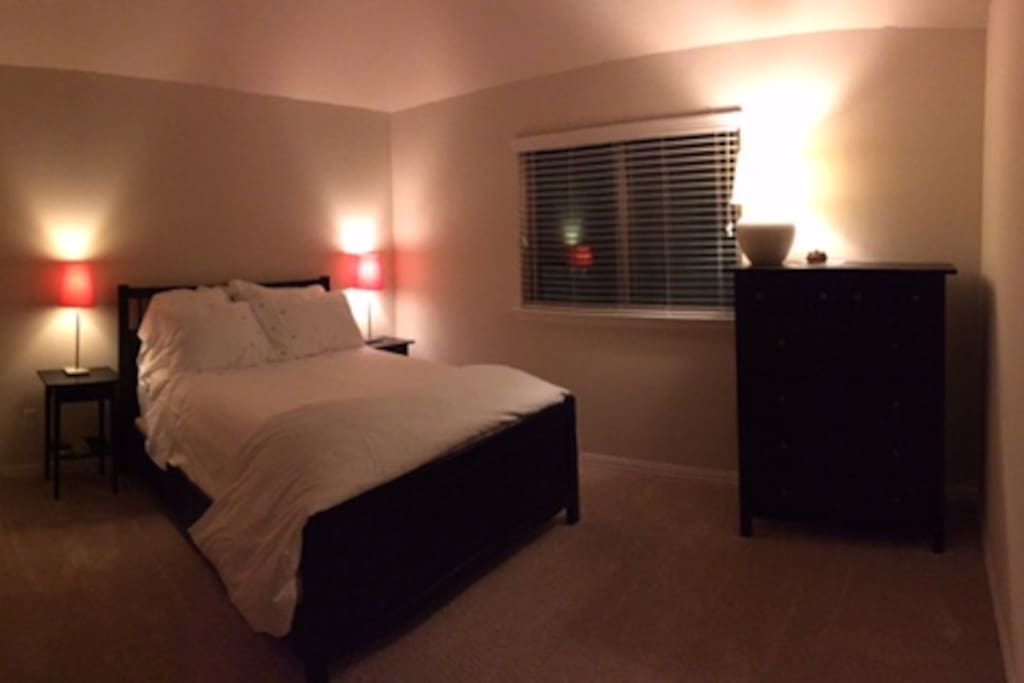 Tranquility and comfort on a queen sized bed with luxurious italian sheets and duvet/comforter and plush pillows