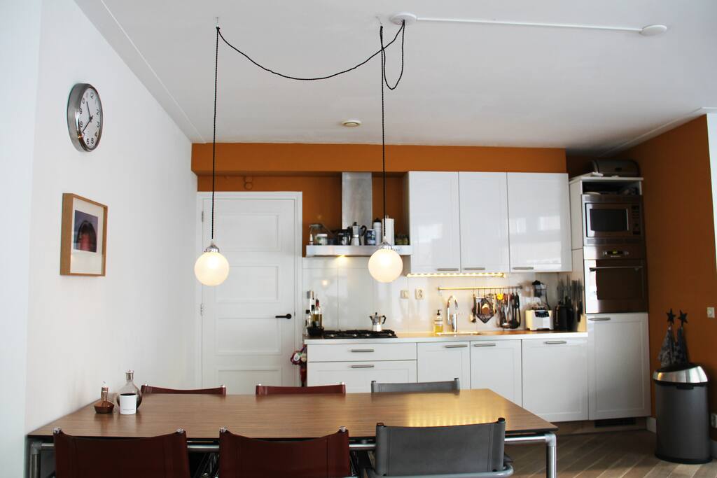 Large dining table and open kitchen