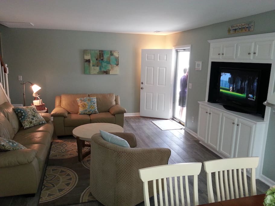 Recently renovated living room with flat screen entertainment