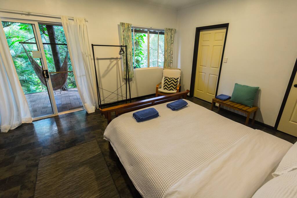 The bedroom has a sliding door to the veranda
