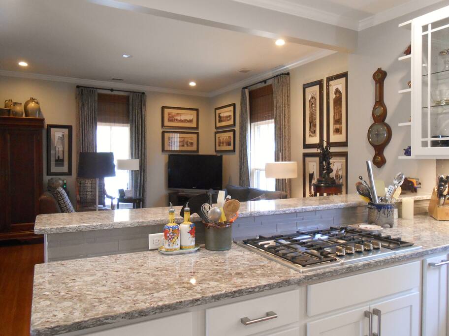 Kitchen open to living room with bar