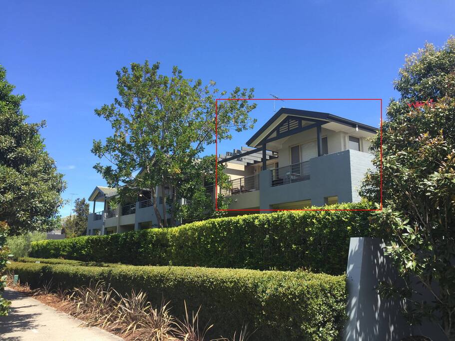 Front of apartment with balcony off the living room