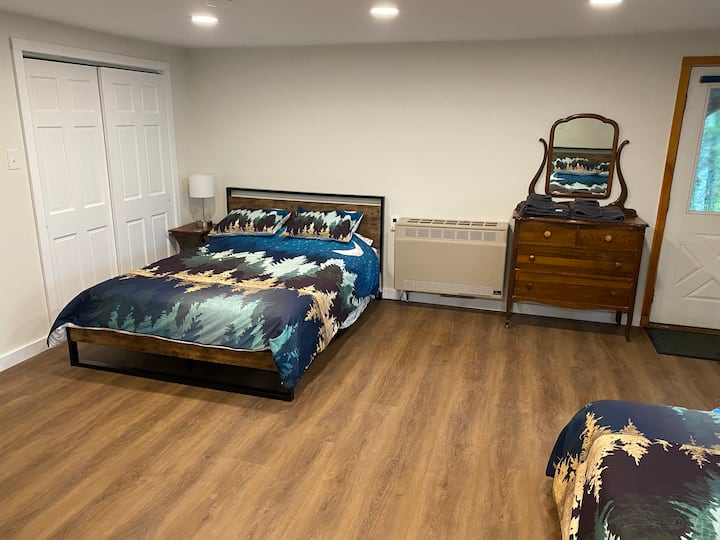 The second bedroom with lake views has two queen beds, a nicely sized closet for guest use and two dressers so you can make yourself right at home.