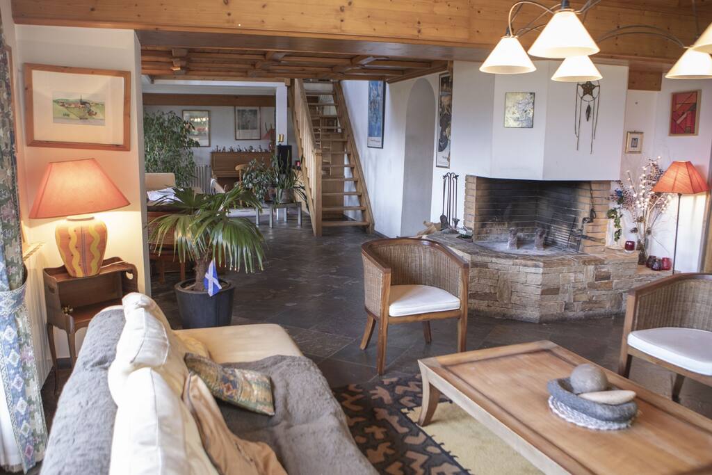 Bright living room with many couches