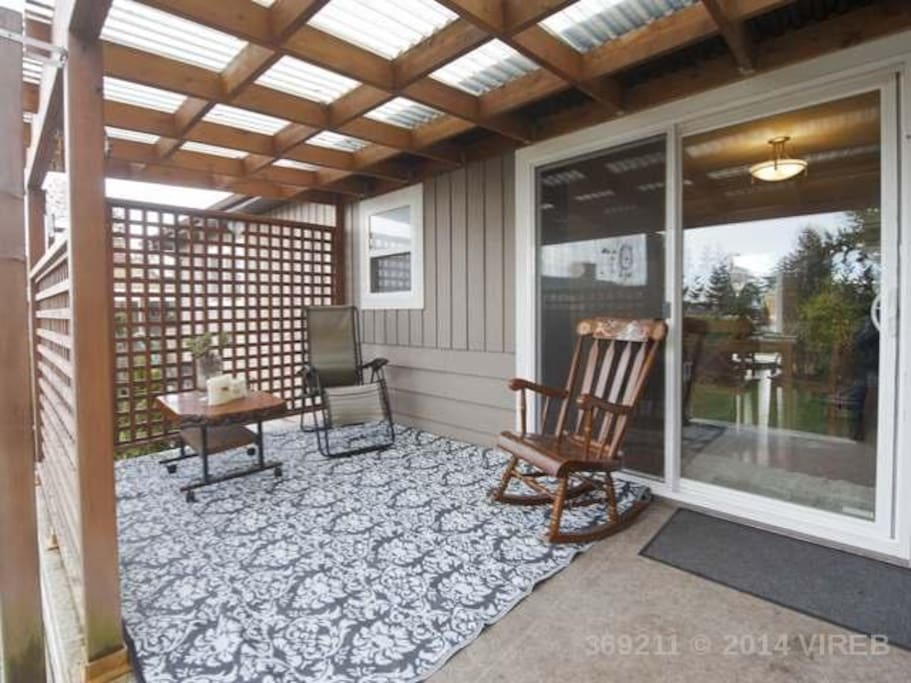 Covered backyard patio off of dining room