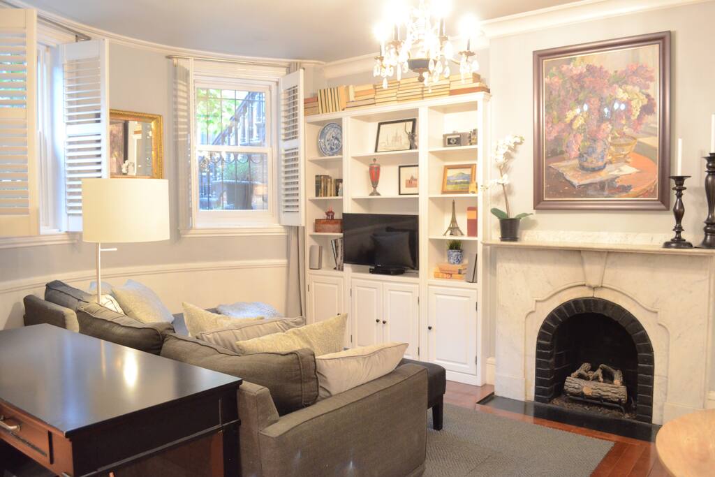 Couch with TV and fireplace