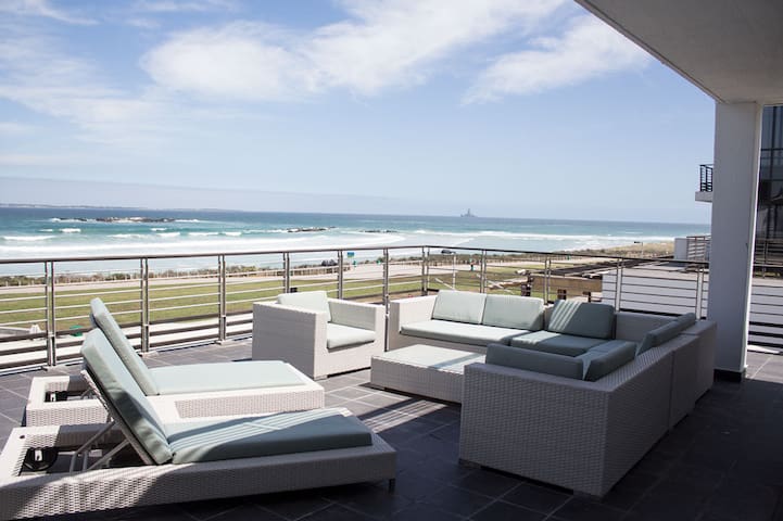 Modern apartment steps away from the ocean!