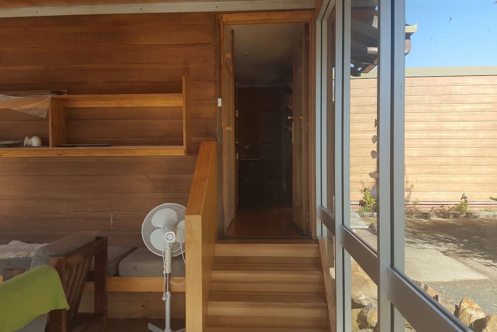 The sunroom leads into the sitting room