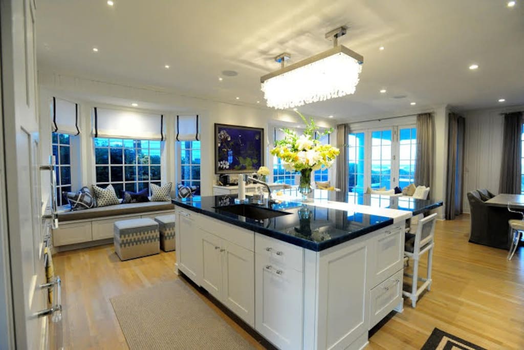 Chef's kitchen with beach views - open the doors and let in the breeze and sounds of the waves