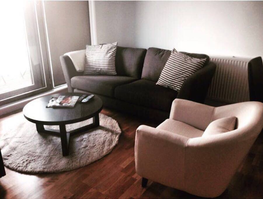 Living room with natural light and access to balcony