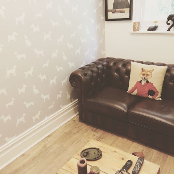 The 'den'- stylish space to unwind. Comfortable, leather sofa bed turning this space into a second single bedroom.
