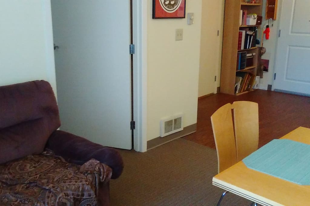 This is the door to your bedroom, next to the couch I sleep on. I sleep on the couch even when I don't have guests!