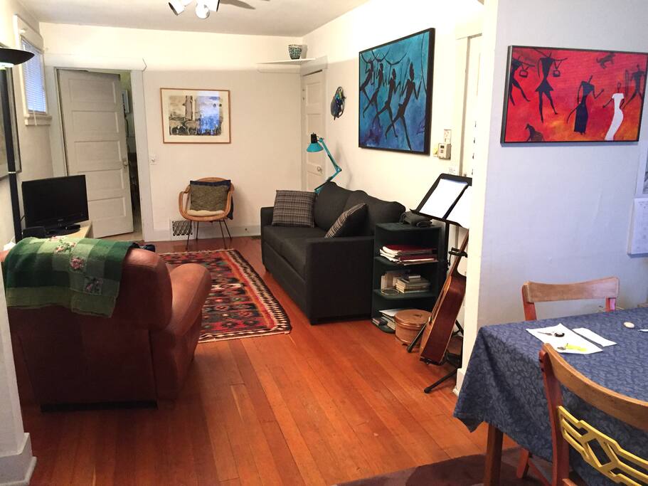 Front room, viewed from entrance, showing door to kitchen.
(On the right is door to upstairs and bathroom)