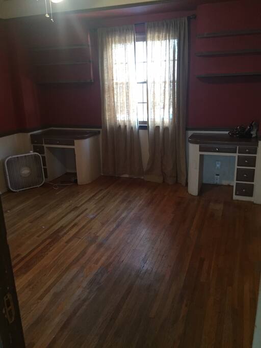 Bedroom 1 - Will have two twin beds + an air mattress for add'l sleeping space. Window AC unit.