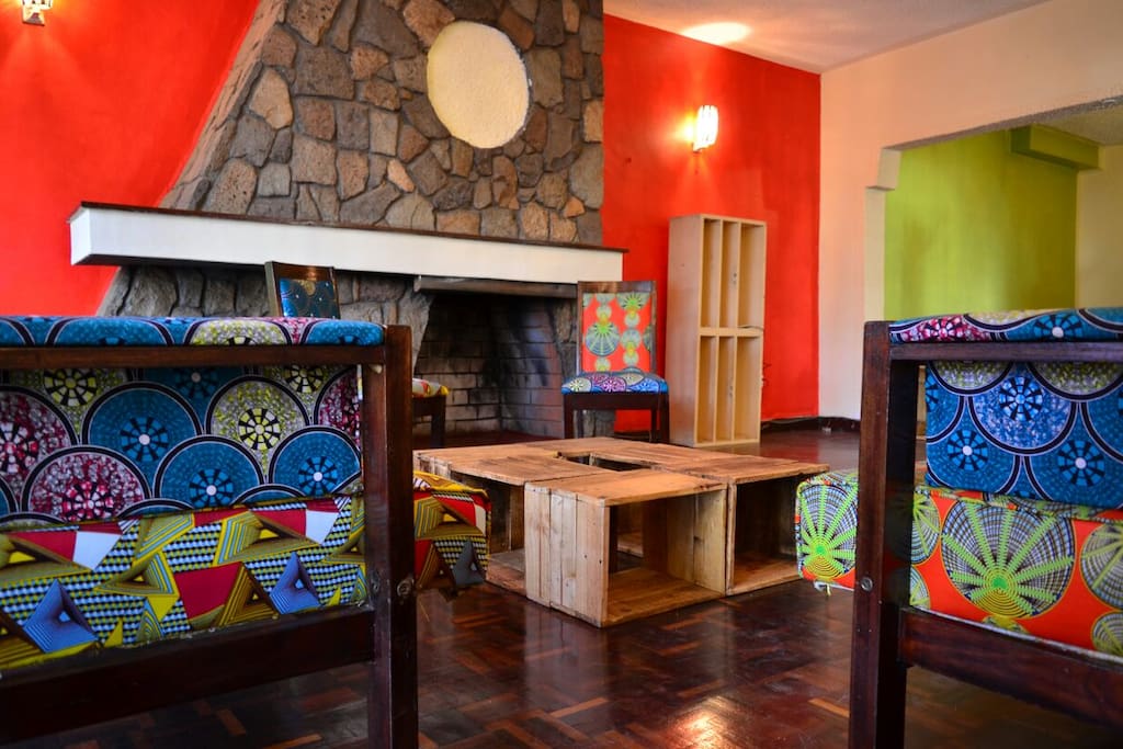 Living Room w/ Kitenge Fabric Sofas + Pallet Table / Stools