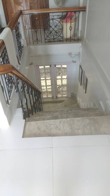 Stairs to the 1st floor, if you want to access the main porch.