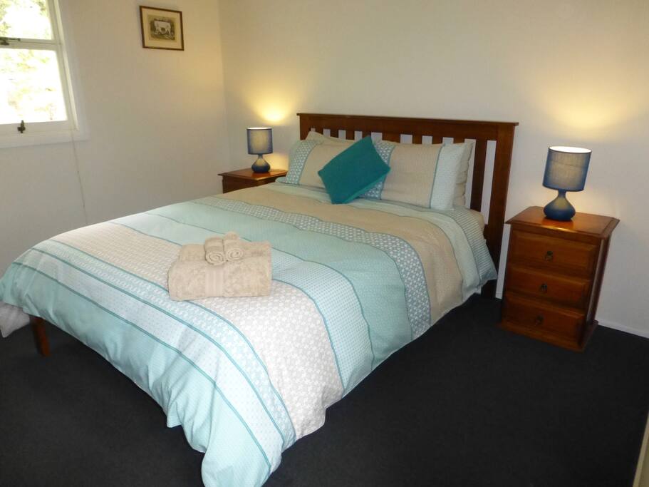 Acacia Cottage amongst the Trees ... The main bedroom has a new queen bed and mattress ... super comfortable.