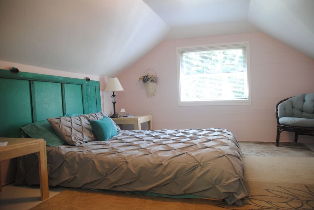 The larger attic bedroom with queen sized bed