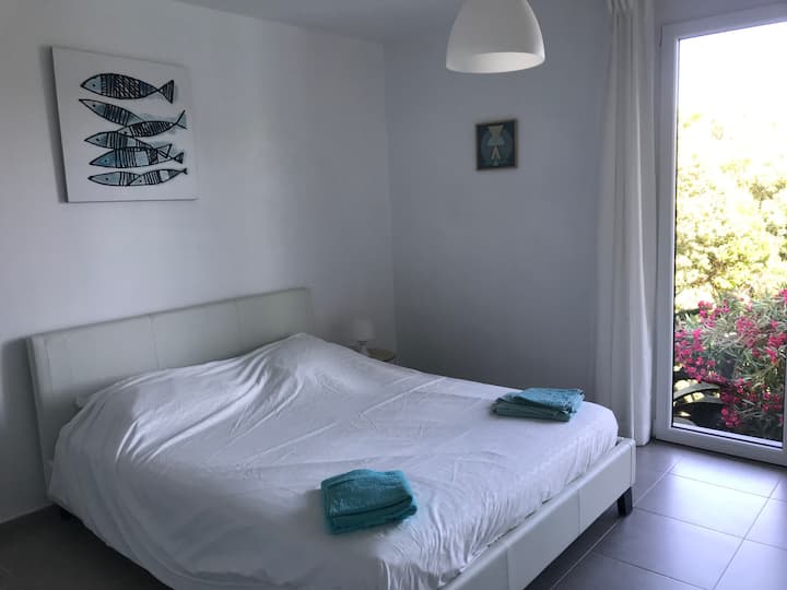 Turquoise bedroom with double bed