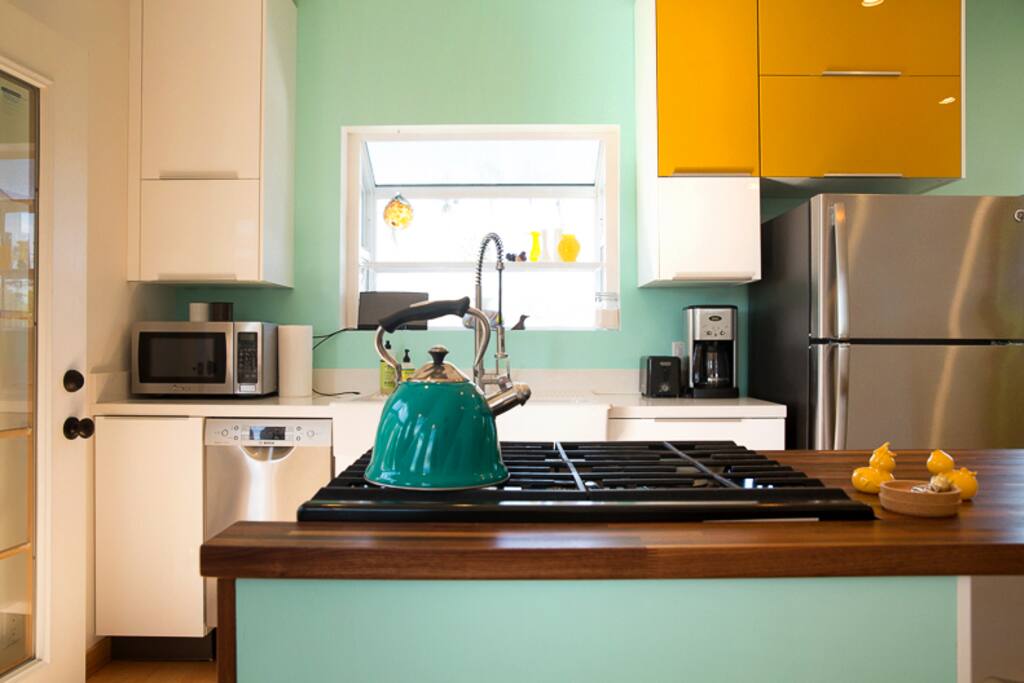 Full Kitchen with all modern appliances; kitchenaide range and oven, bosch dishwasher, microwave, fridge, coffee maker, toaster....