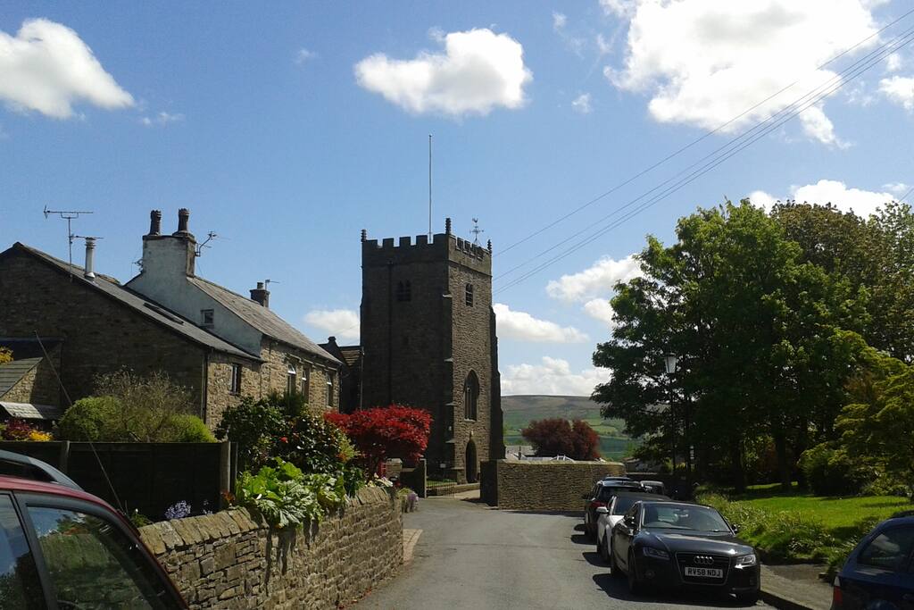 view to the right ;14th century church.