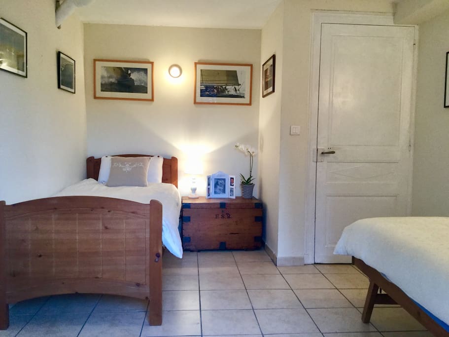 Twin bedded room form opposite end of room.