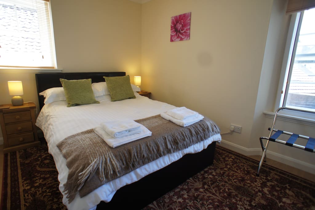 Sunny and bright double bedroom, with quality bed linen and towels