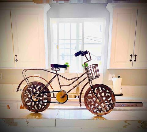 The 3C: Cozy, Cyclists, Citrus urban retreat.
