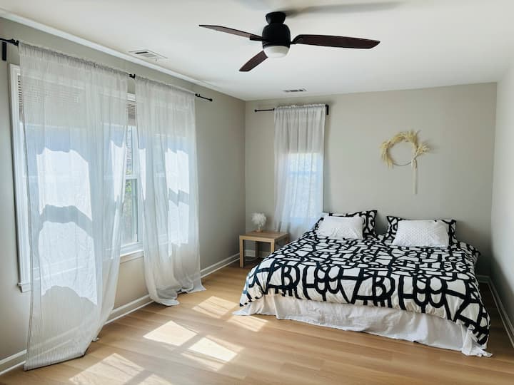 Master bedroom with king  bed and 55'' flat screen TV