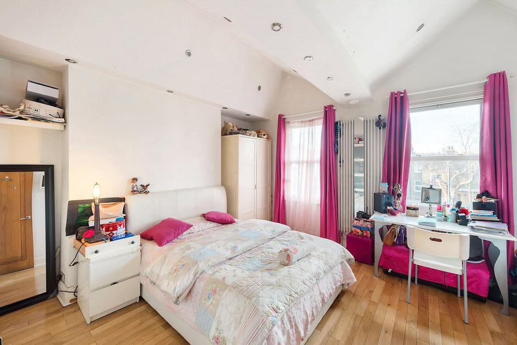 Large and beautiful double bedroom with workspace, double bed and sofa
