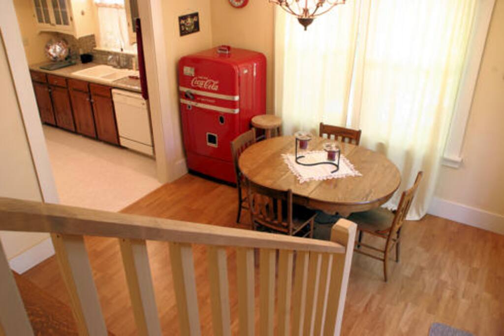looking down in the dining area from the stairs
