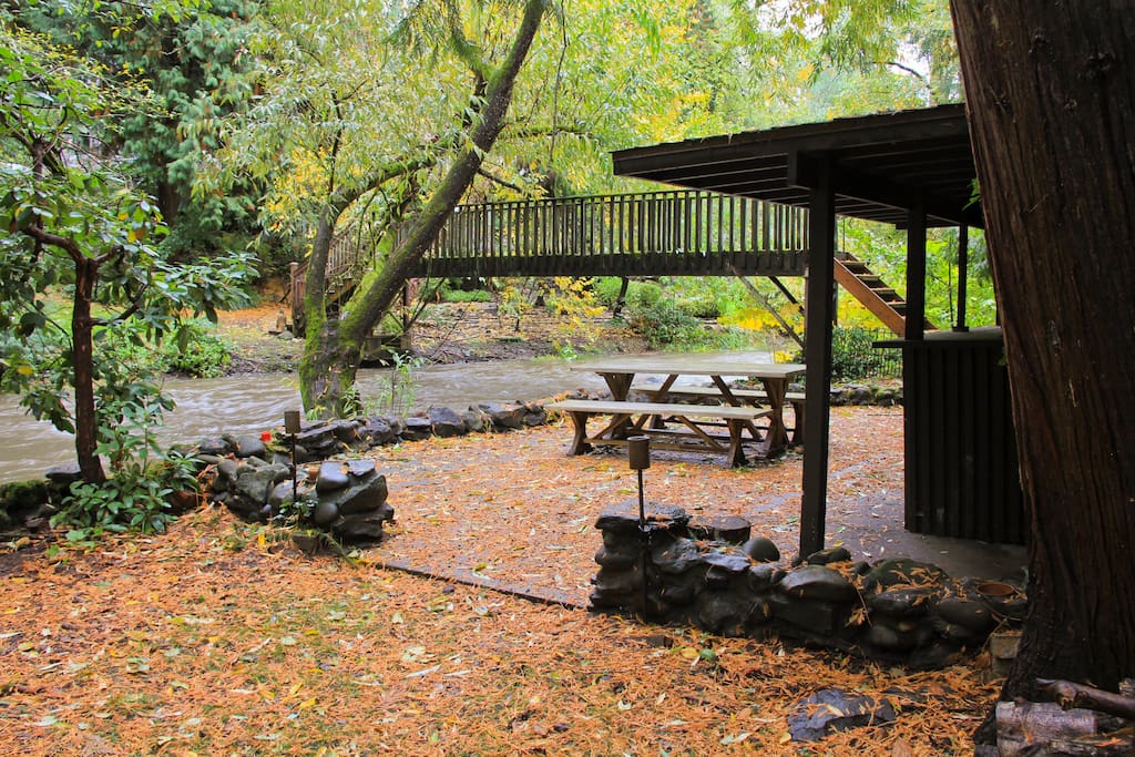 Picnic area and creek behind the cabin