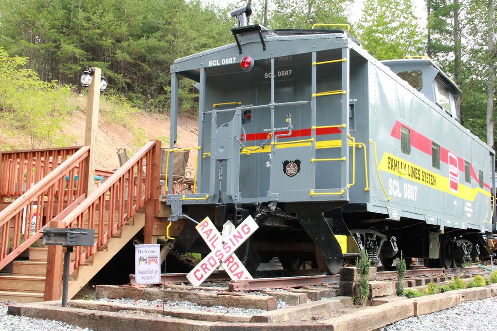 Seaboard Coast Line Caboose, on a bison ranch. Trains for Rent in
