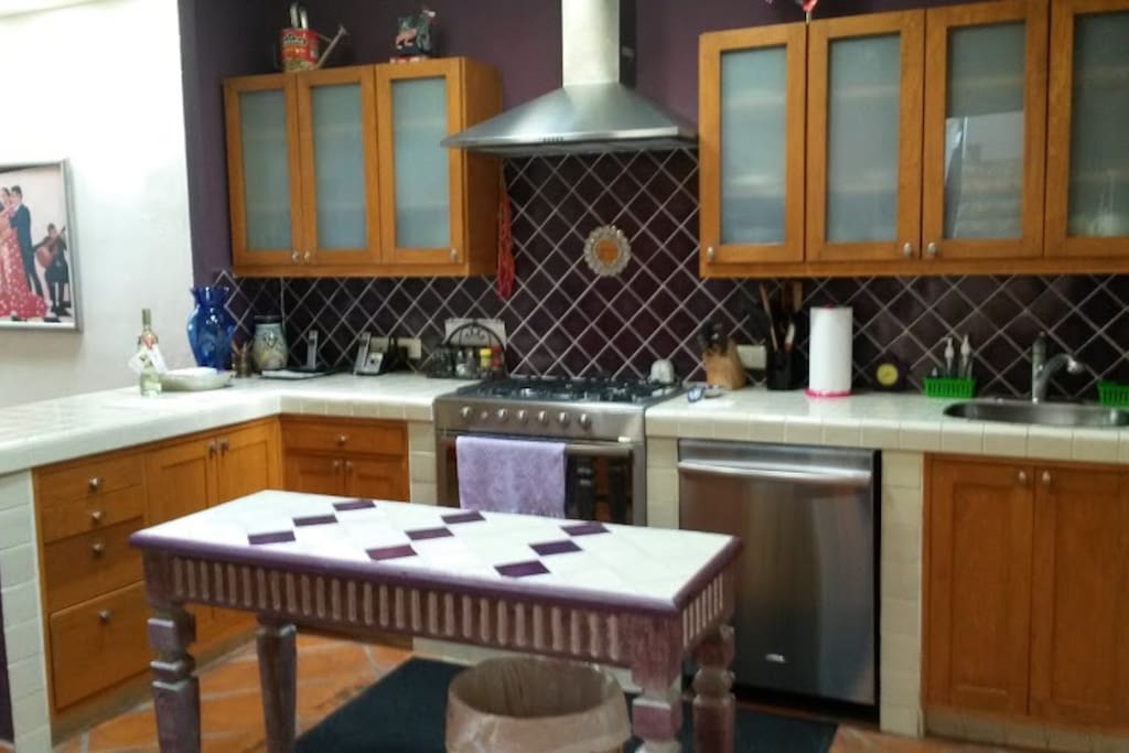 Kitchen with dishwasher and purified water system