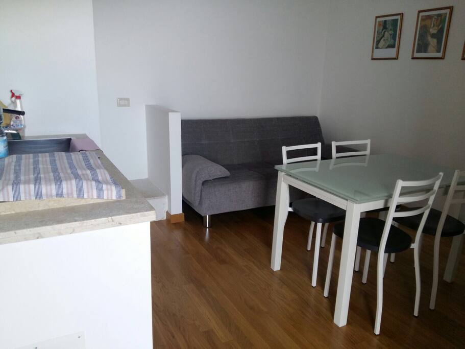 Soggiorno con divano letto