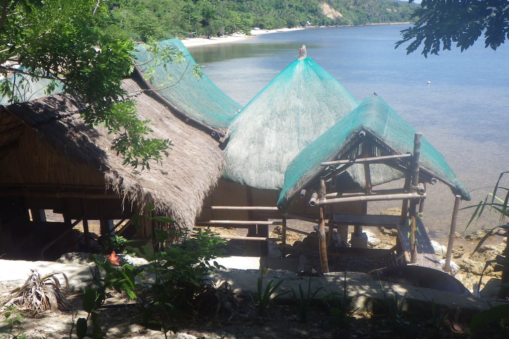 View of Molbog-Tagbanua SandCastles pavilion set in Bali-style compound with plunge pool. Sleeps up to 6. Fan-cooled