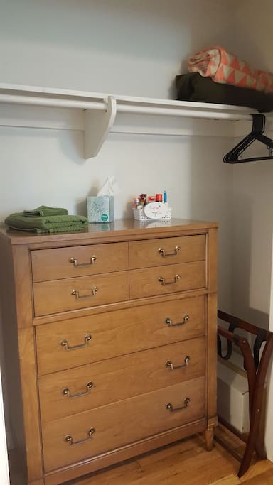 The vintage dresser and closet provide lots of space for your clothing.