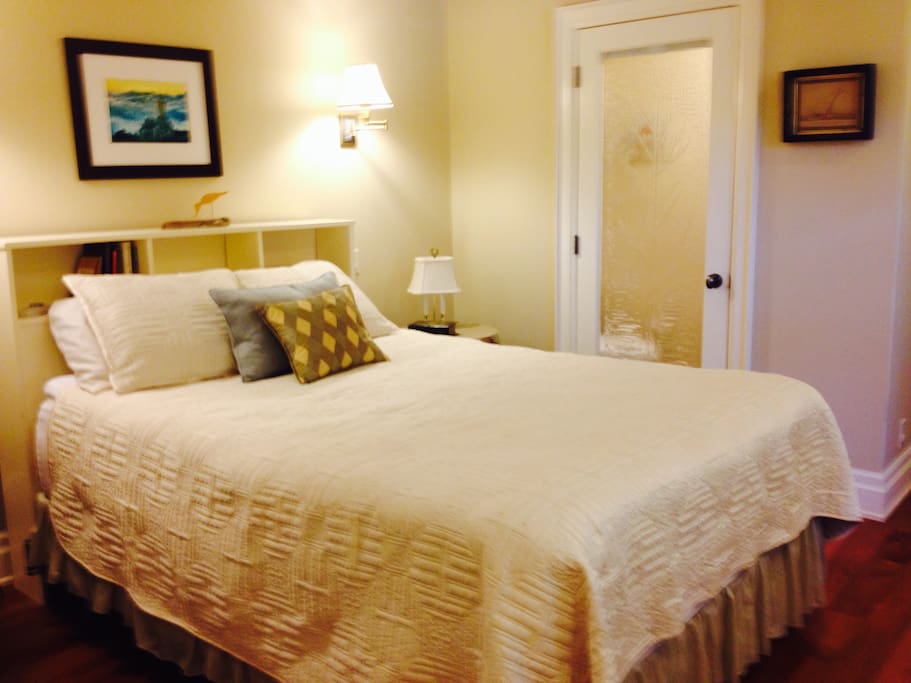 Bedroom for guests on main floor, right off entrance foyer. Come and go with privacy.