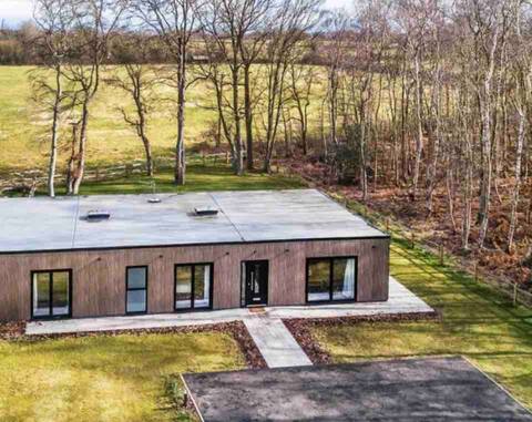 Modern home - bifold doors, social space, garden.
